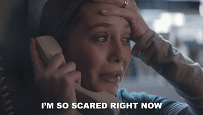 Woman Talking On Phone Saying I'm So Scared GIF