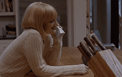 Woman Talking On Phone GIF