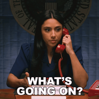 Woman Talking On Red Telephone Saying What's Going On GIF