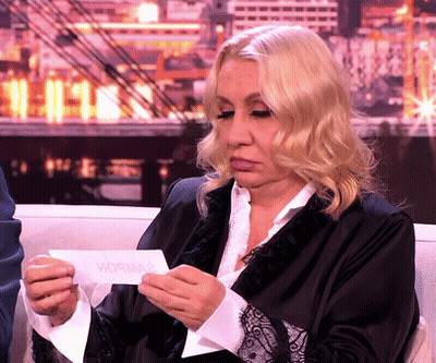 Woman Talking On TV With Foreign Caption GIF