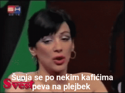 Woman Talking On TV With Foreign Caption GIF