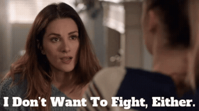 Woman Talking to Another Woman Saying I Don't Want to Fight Either