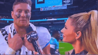 Woman Talking To Football Player On TV GIF