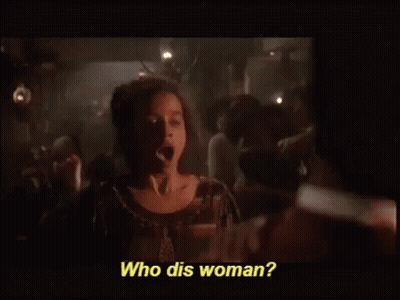 Woman Talking To Man In Dark Room Saying Who Dis Woman GIF
