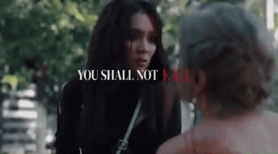 Woman Talking To Man In Park Saying You Shall Not Kill GIF