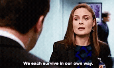 Woman Talking To Man In Suit Saying We Each Survive In Our Own Way GIF