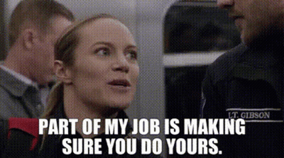 Woman Talking To Man On Train Saying Part Of My Job Is Making Sure You Do Yours GIF