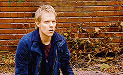 Woman Talking To Man Saying I Will Protect Them Both GIF