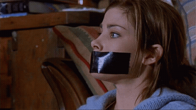 Woman Taped To Couch Mouth Duct-Taped GIF