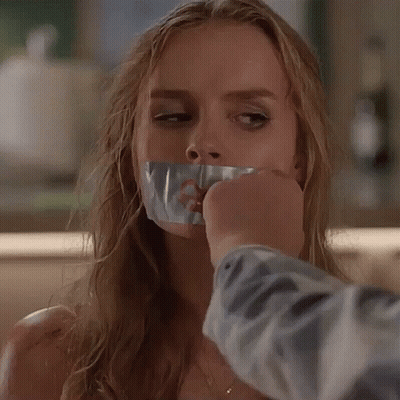 Woman Taped To Table With Duct Tape On Mouth GIF