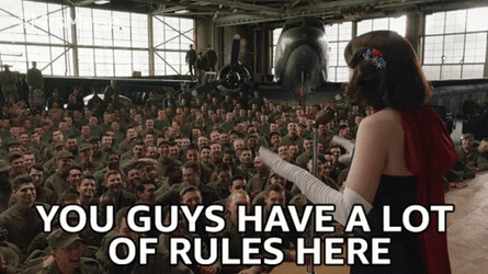 Woman Teaching Many Men GIF