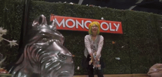 Woman Throwing Monopoly Money Into Air GIF