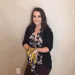 Woman Throws The Confetti Cannon GIF