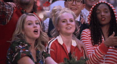 Woman Thumbs Up In Crowd GIF