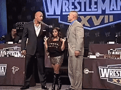 Woman Thumbs Up In Front Of Wrestle University Sign GIF