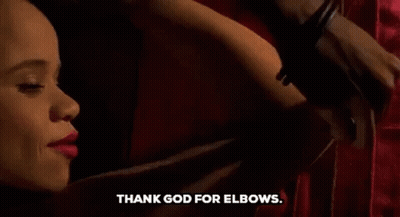 Woman Tied Up Saying Thank God For Elbows GIF