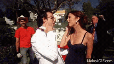 Woman Touching Man's Face GIF