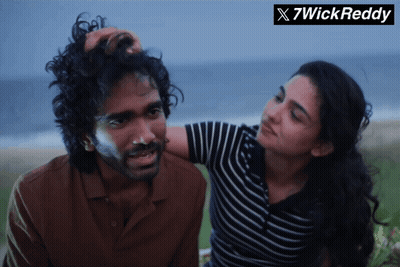 Woman Touching Man's Head With 7Wickreddy Logo GIF