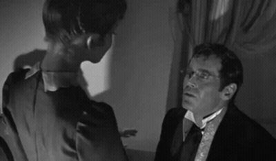 Woman Touching Man's Neck Black And White GIF