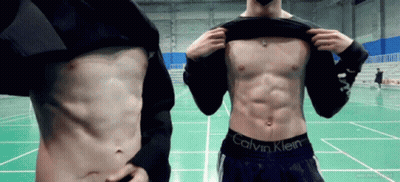 Woman Touching Shirtless Man's Stomach GIF