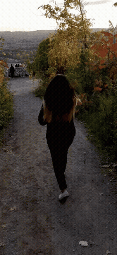 Woman Walking City View Path GIF
