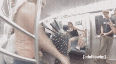 Woman Walking Down Train Stairs GIF