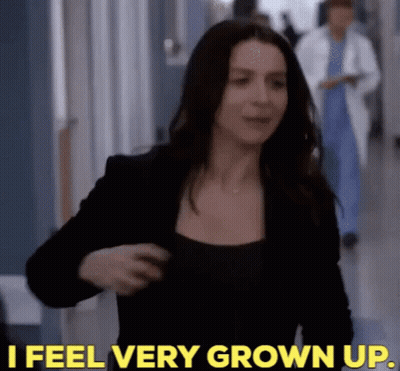 Woman Walking Hallway I Feel Very Grown Up GIF