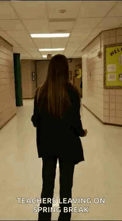 Woman Walking Hallway Teachers Leaving GIF