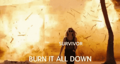 Woman Walking In Front Of Explosion Survivor Burn It All Down GIF