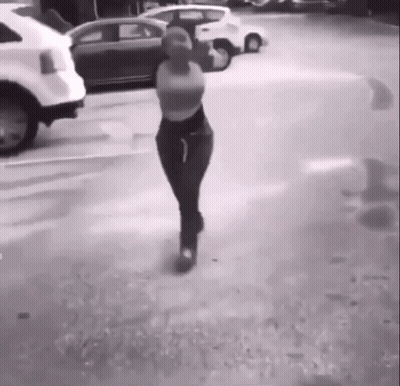 Woman Walking In Parking Lot GIF