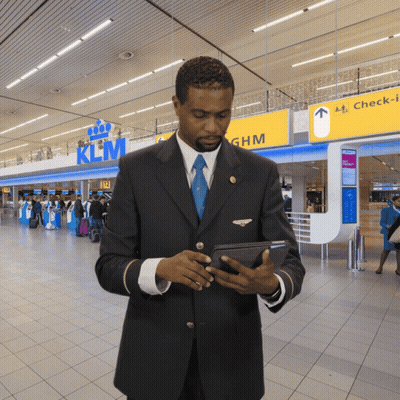 Woman Walking On Escalator Saying Qantas GIF
