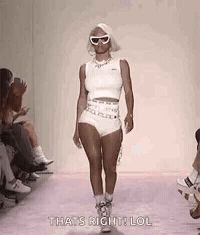 Woman Walking Runway In Sunglasses GIF