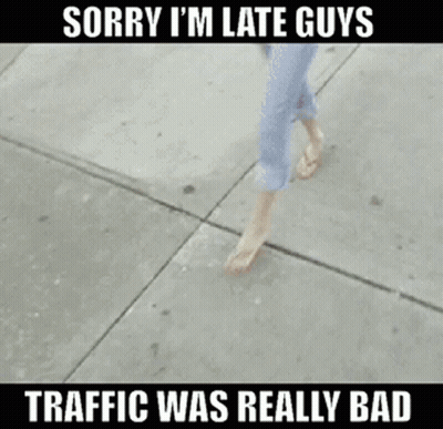 Woman Walking Sidewalk Saying Sorry I'm Late Guys