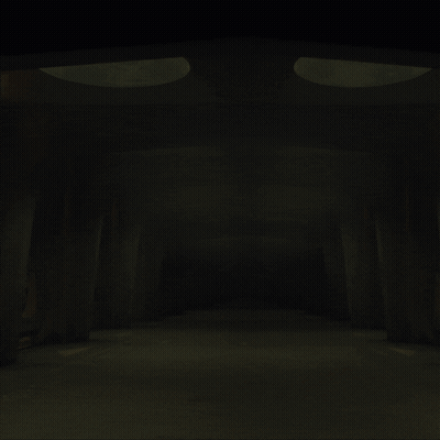 Woman Walking Through Dark Hallway With Spotlights GIF