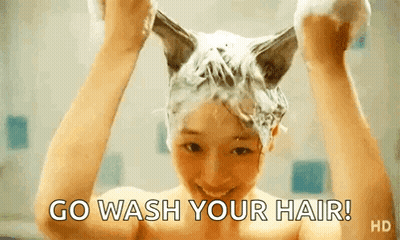 Woman Washing Hair In Bathtub With Cat Ears GIF