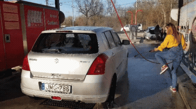Woman Washing Suzuki Car With License Plate JMG-786 GIF