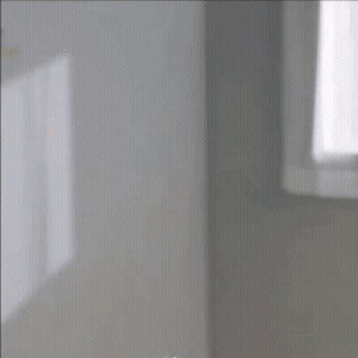 Woman Waving At Mirror GIF