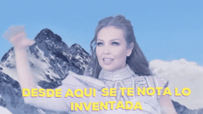 Woman Waving Before Mountain Saying Desde Aqui Se Te Nota Lo Inventada GIF