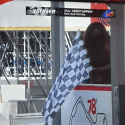 Woman Waving Checkered Race Flag GIF