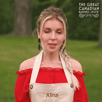 Woman Wearing Apron With Name Alina GIF