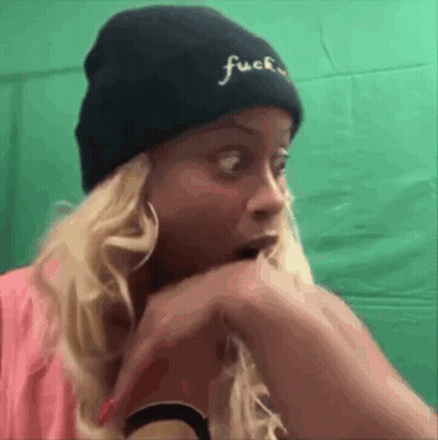 Woman Wearing Black Beanie With Embroidered Word GIF