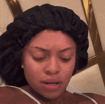 Woman Wearing Black Hat And White Bra GIF