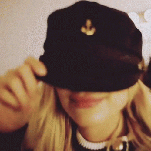 Woman Wearing Black Hat With Gold Anchor GIF