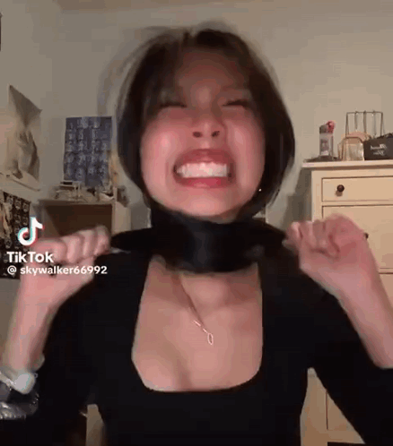 Woman Wearing Black Shirt And Black Scarf GIF