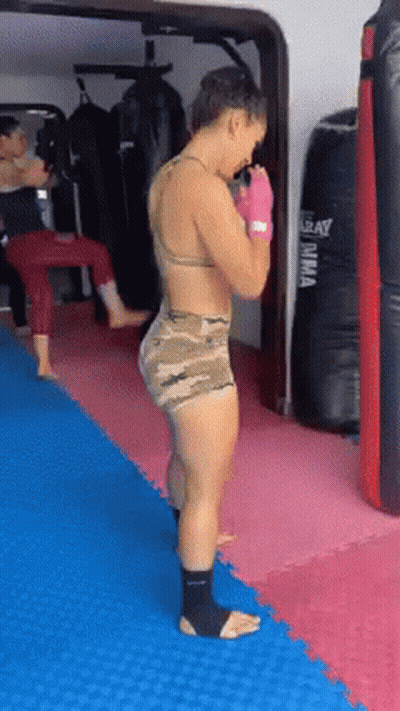 Woman Wearing Boxing Gloves GIF