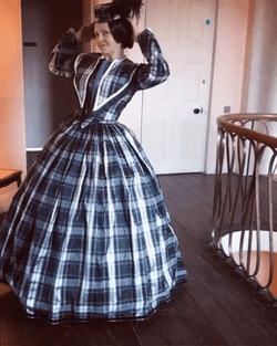 Woman Wearing Checkered Dress GIF