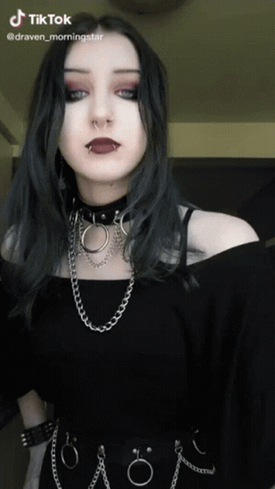 Woman Wearing Choker And Chains GIF