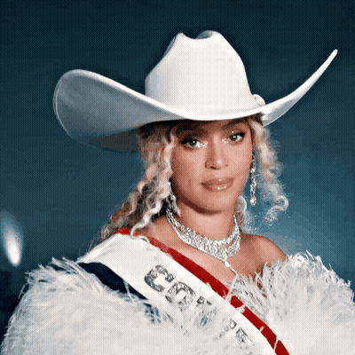 Woman Wearing Cowboy Hat And Sash GIF