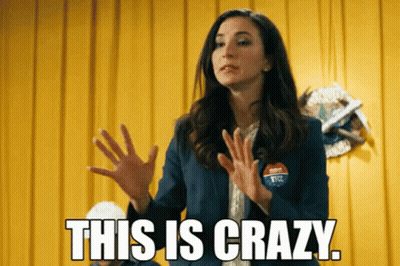 Woman Wearing Crazy Badge GIF