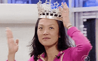 Woman Wearing Crown And Waving GIF